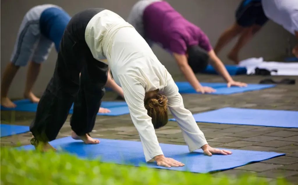 Yoga session reflecting Austin's recovery yoga community's focus on mindfulness and healing.