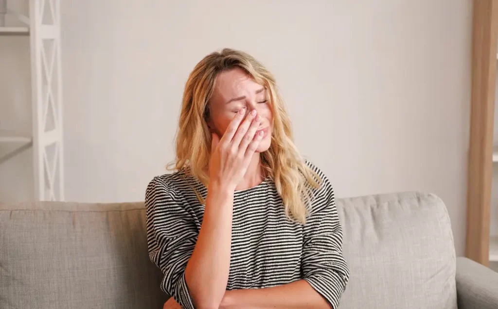 Sorrowful situation sad woman regrets addiction