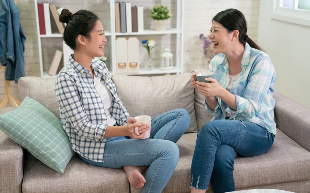 Roommates Talking while Drinking Coffee