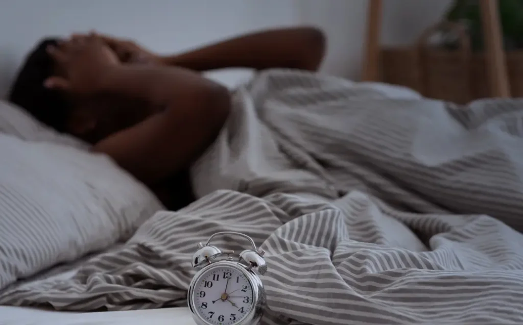Sleepless, woman suffering from insomnia