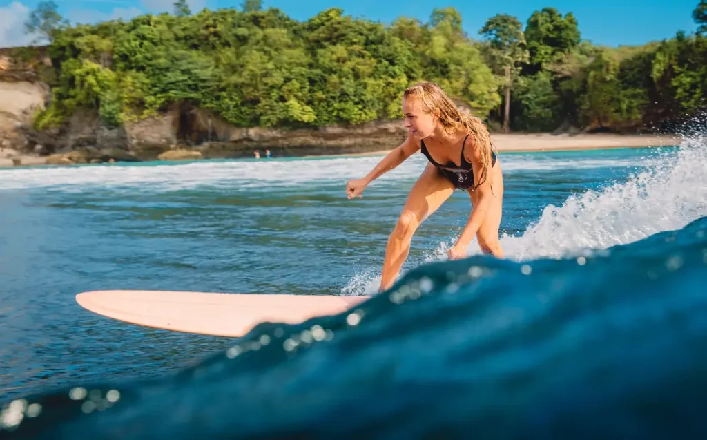 Woman during surfing.