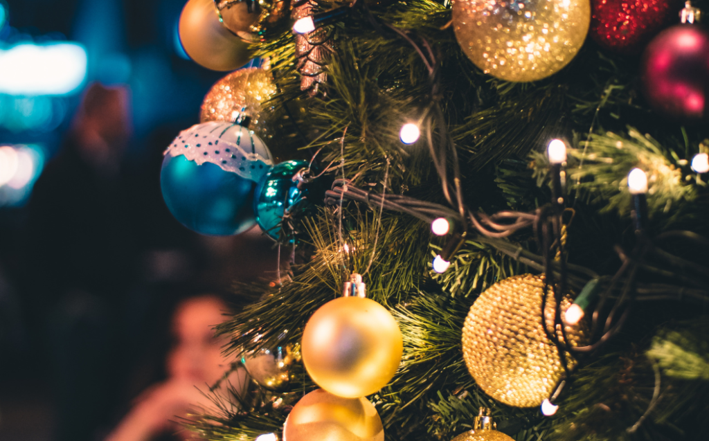 Green and Gold-colored Lighted Christmas Tree